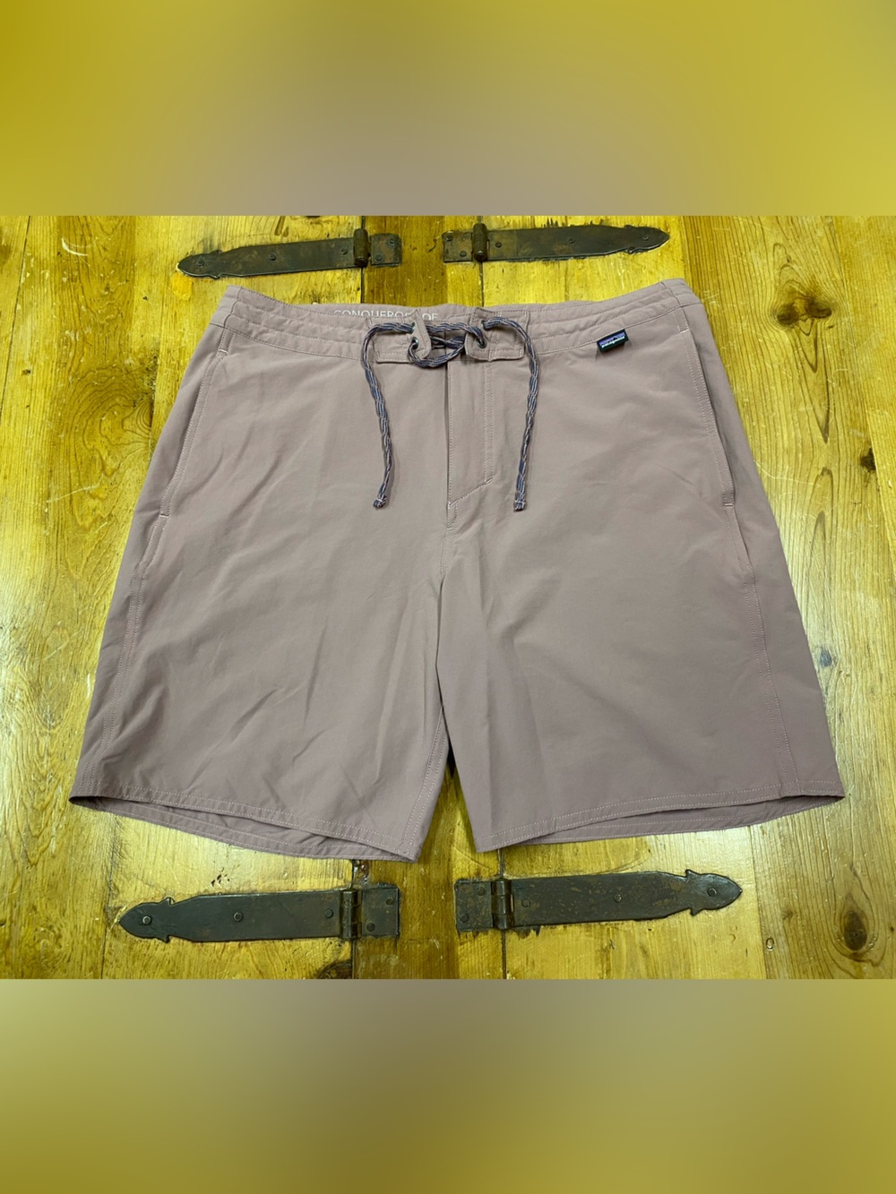 Patagonia Men’s Mauve-rose wayfarer hybrid walking shorts.
